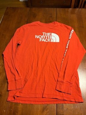 The North Face Men's Long Sleeve Tee in Burnt Orange with White Logo